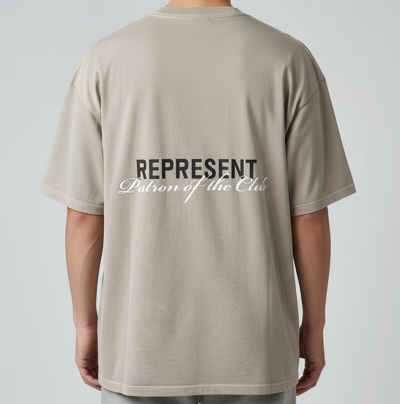 Represent Patron Of The Club Tee in mudstone color, showcasing a casual men's t-shirt with graphic design and brand logo.