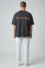 AllSaints Underground Logo Tee in Ashen Dakota Black, featuring a casual black T-shirt with the brand's logo on the front.