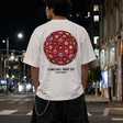 Takashi Murakami Bright Red Flower Ball Tee in white, featuring colorful floral graphic on front, casual apparel for fans of modern art.