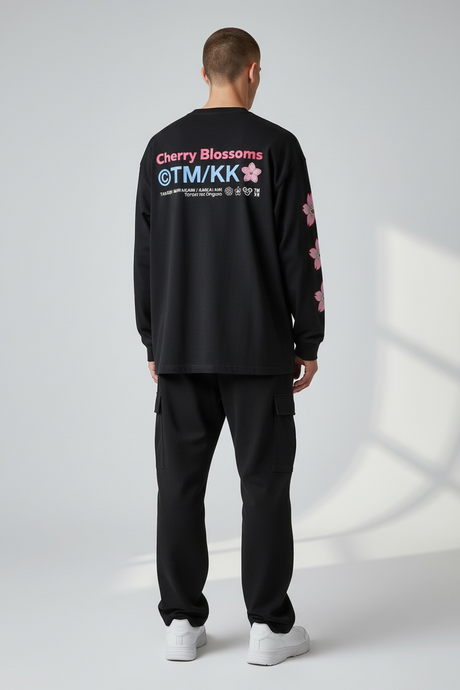 Takashi Murakami black long sleeve tee featuring embroidered sakura flower patch, stylish apparel with vibrant floral design.