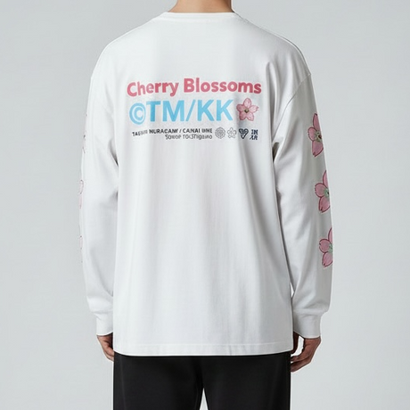 Takashi Murakami white long sleeve tee featuring embroidered sakura flower patch, casual apparel with artistic design.