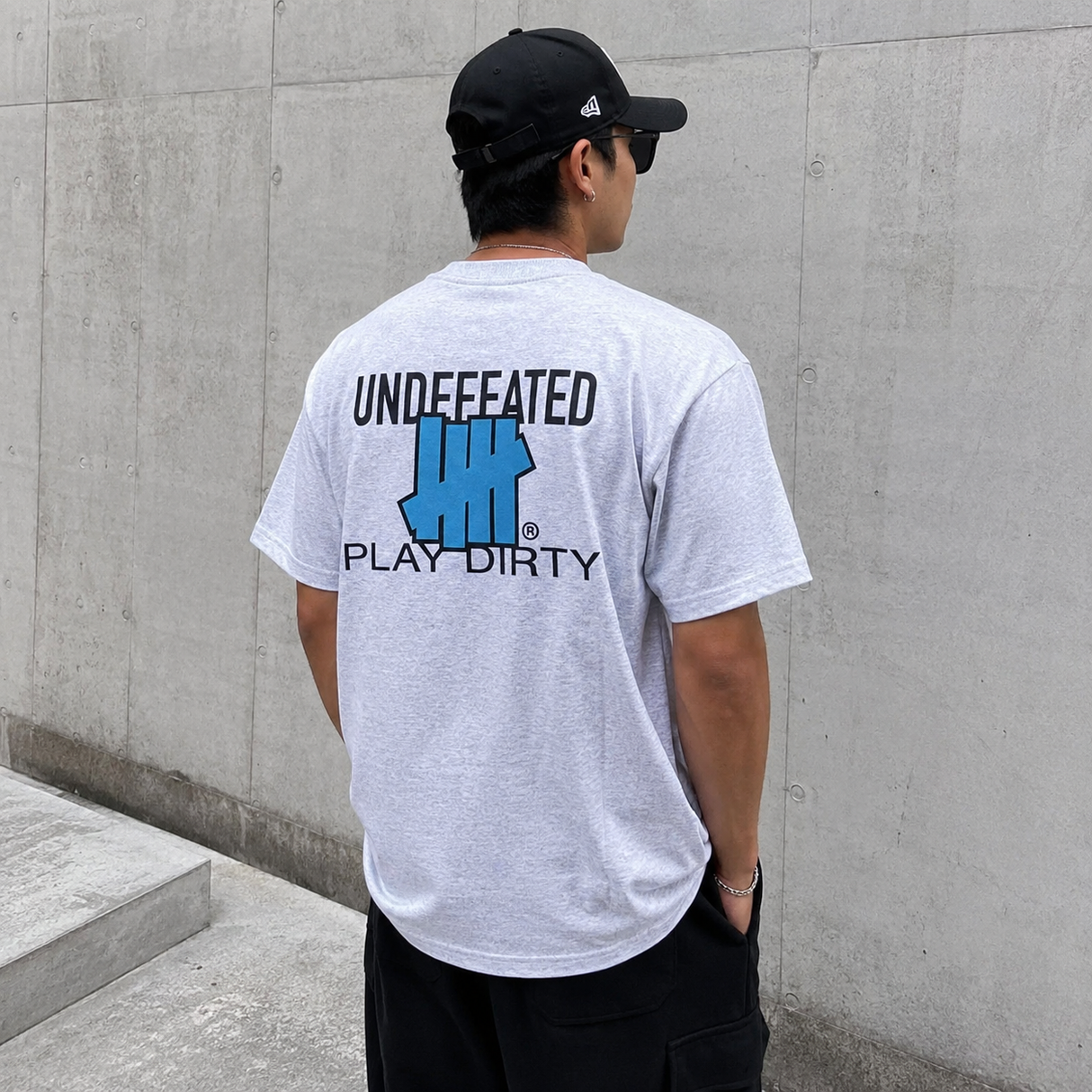 Light gray Undefeated Trademark Tee from UNDEFEATED with a classic logo printed on the front, displayed on a neutral background.