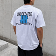 Undefeated Trademark Tee Heather from UNDEFEATED featuring a casual fit and printed logo on soft heather fabric.