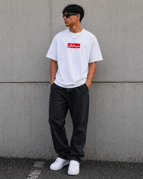 White Supreme Arabic Box Logo Tee, a casual apparel T-shirt with bold Arabic script and Supreme branding on the front.