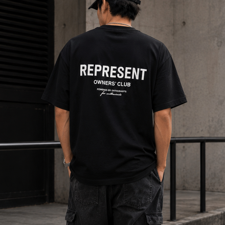 Black REPRESENT Owners Club Logo Tee shirt with front graphic design and branding detail, casual men's or women's T-shirt.