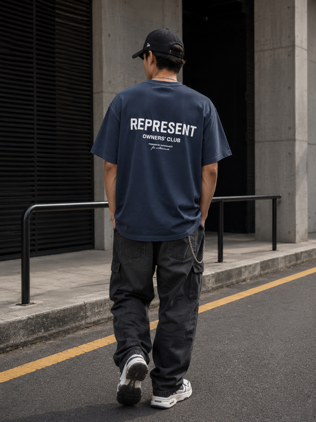Black Represent Owners Club Logo T-shirt featuring a prominent logo design on the front, casual fit, and crew neckline.