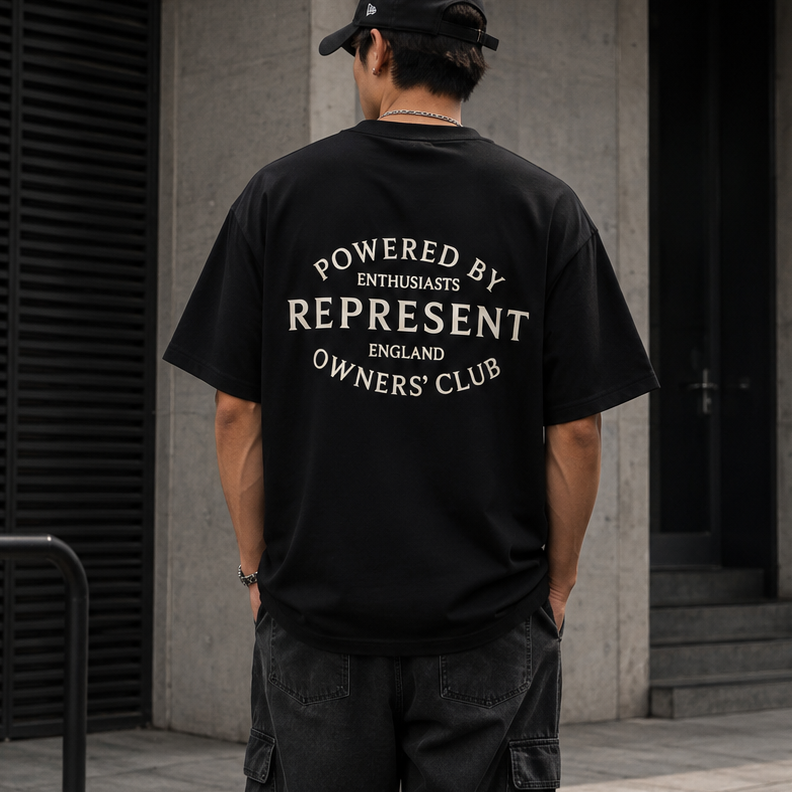 Black Represent Stamp Logo Tee featuring a bold logo graphic on the front, casual fit, and soft cotton fabric.