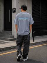 Gray Represent Patron Of The Club Tee displayed on a hanger, showcasing a casual apparel item with stylish branding details.