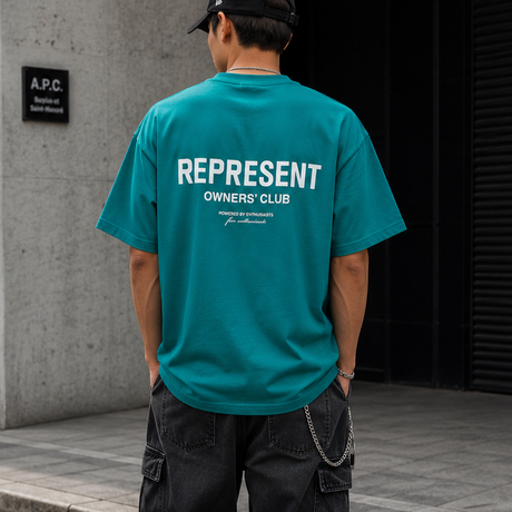 Teal Represent Owners Club Logo T-shirt featuring bold graphic design on front, casual streetwear style, final sale.