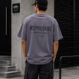 Represent Owners Club Applique Logo Tee in storm color, featuring a stylish logo design on a casual T-shirt.