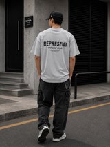 Ash grey Represent Owners Club Logo T-shirt featuring a front graphic, casual fit, and soft cotton fabric.