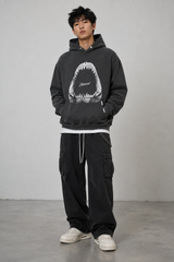 Represent Shark Jaws Hoodie in Off Black, featuring a bold shark graphic on the front, casual streetwear style, and comfortable fit.