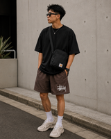 Brown Stussy Basic Big Logo nylon shorts with a relaxed fit and bold logo on the front, perfect for casual wear.
