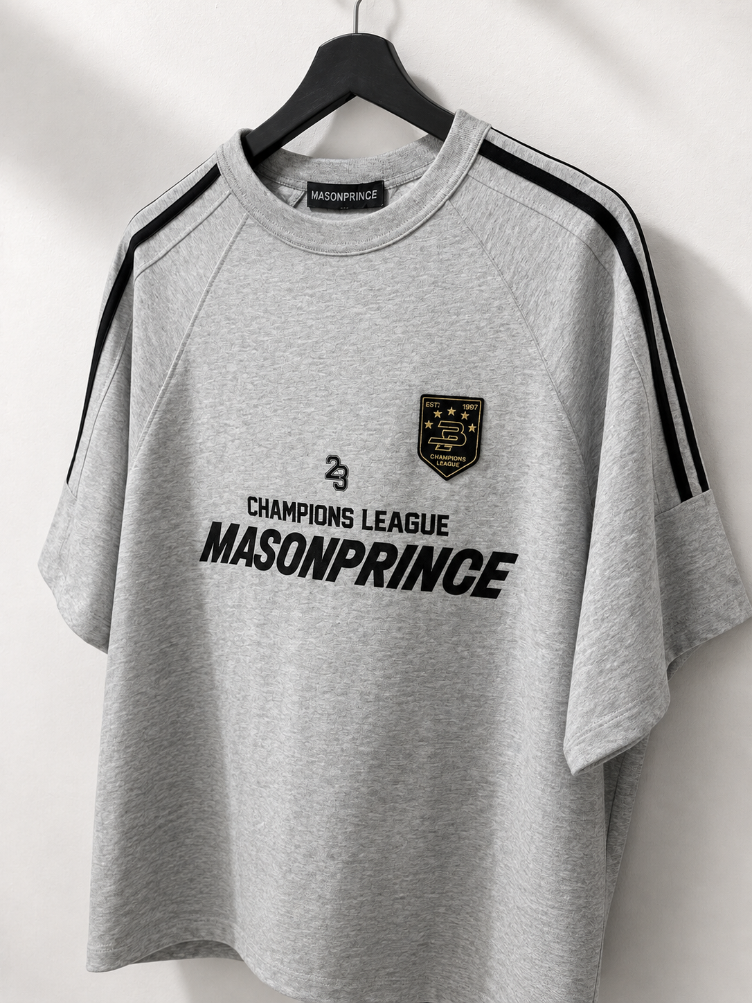 Grey MasonPrince Millennium OV Raglan Tee, casual men's apparel with contrasting sleeves and brand logo detail.
