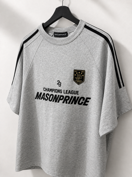 Grey MasonPrince Millennium OV Raglan Tee, casual men's apparel with contrasting sleeves and brand logo detail.