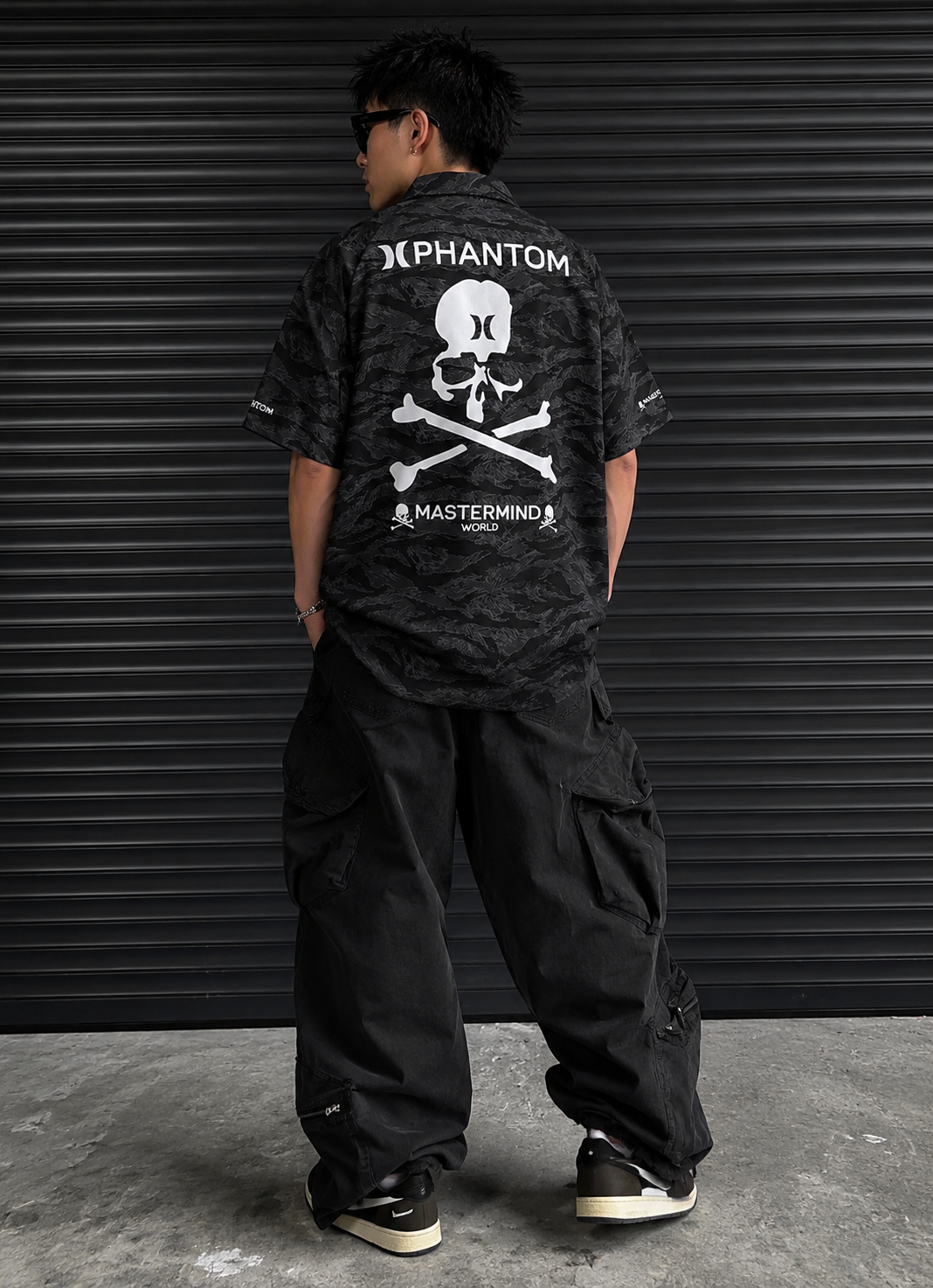 Mastermind Japan Phantom Woven Shirt featuring intricate patterns and high-quality fabric, displayed as an accessory in the image.