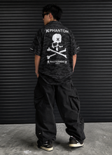 Mastermind Japan Phantom Woven Shirt featuring intricate patterns and high-quality fabric, displayed as an accessory in the image.
