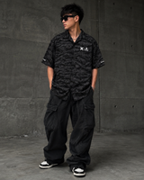 Mastermind Japan Phantom Woven Shirt accessory featuring intricate woven fabric and detailed design.