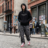 Black Supreme Classic Logo Hoodie with front logo design, casual fit, and soft fabric, shown from front view.