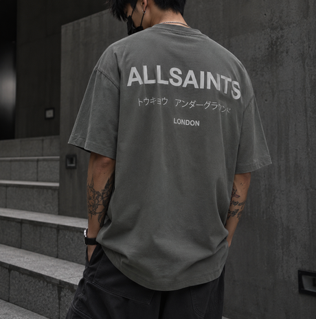 AllSaints Underground Logo Tee in Garnet Green displayed, featuring the brand's logo graphic on a casual t-shirt for men.