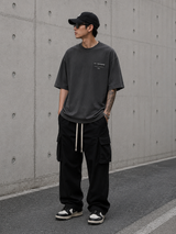 AllSaints Redact Strikeout Logo T-shirt in washed black, casual apparel with bold logo design and comfortable fit.