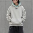 Fear of God Essentials box logo hoodie, black sweatshirt with appliqué design, casual streetwear apparel.