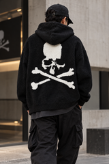 Black and white Mastermind Japan lounge hoodie, casual apparel with logo details, shown on a hanger.