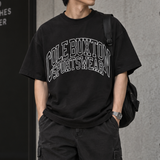 Cole Buxton vintage black tee with arch logo, casual apparel featuring minimalist design and comfortable fit.