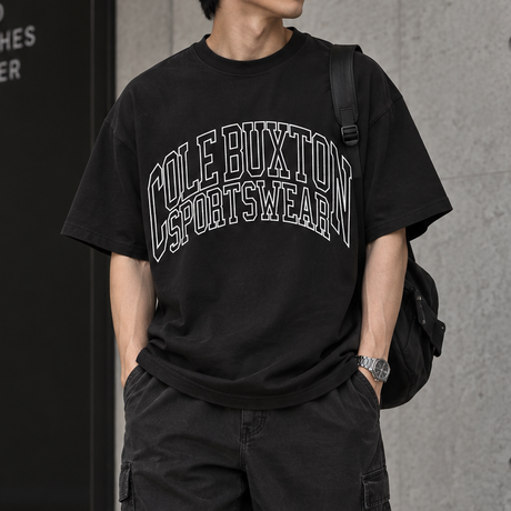 Cole Buxton vintage black tee with arch logo, casual apparel featuring minimalist design and comfortable fit.