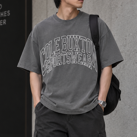 Cole Buxton Arch Logo Tee in washed black, casual apparel with a prominent logo design on the front.