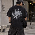 Black Stussy Look Beyond T-shirt, casual apparel featuring bold graphic design, ideal for streetwear and everyday style.
