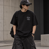 Black Stussy Look Beyond T-shirt featuring bold graphic design, casual fit, and classic streetwear style.