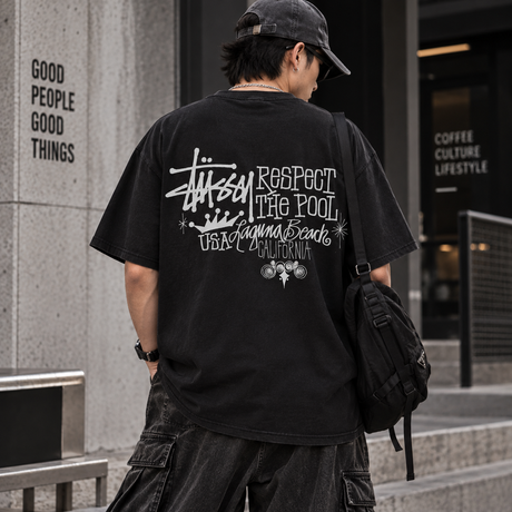 Black Stussy Respect The Pool T-shirt, casual men's apparel, with graphic design and logo on front, displayed flat.