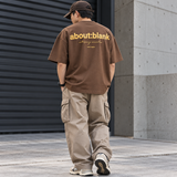 Brown AboutBlank box logo T-shirt featuring a minimalist design, casual apparel from the ABOUT:BLANK brand.