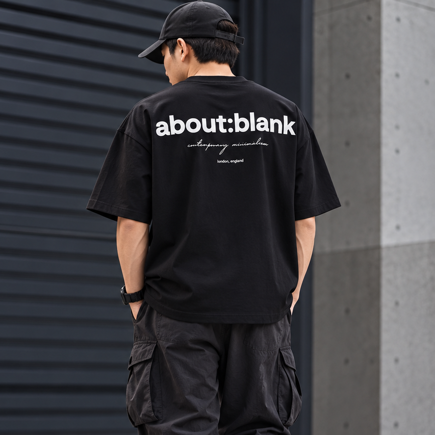 Black ABOUT:BLANK Box Logo Tee, casual apparel with a minimalist design, featuring a prominent box logo on the front.