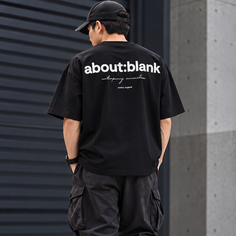 Black ABOUT:BLANK Box Logo Tee, casual apparel with a minimalist design, featuring a prominent box logo on the front.