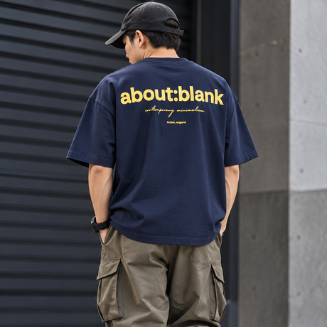 Navy yellow AboutBlank Box Logo Tee from ABOUT:BLANK, featuring a front chest box logo on casual apparel.