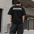 Black AboutBlank Zev Logo Tee shirt, casual apparel with a printed logo design on the front.