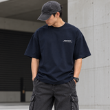 Navy AboutBlank Zev Logo T-shirt with white logo print on front, made of soft cotton, casual fit, designed for everyday wear.