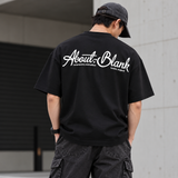 Black AboutBlank Banner Tee from ABOUT:BLANK, featuring a graphic banner design on a casual t-shirt.