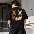 Black Rickyisclown leather tee with gold foil details, featuring a sleek design and modern fit, shown in the product image.