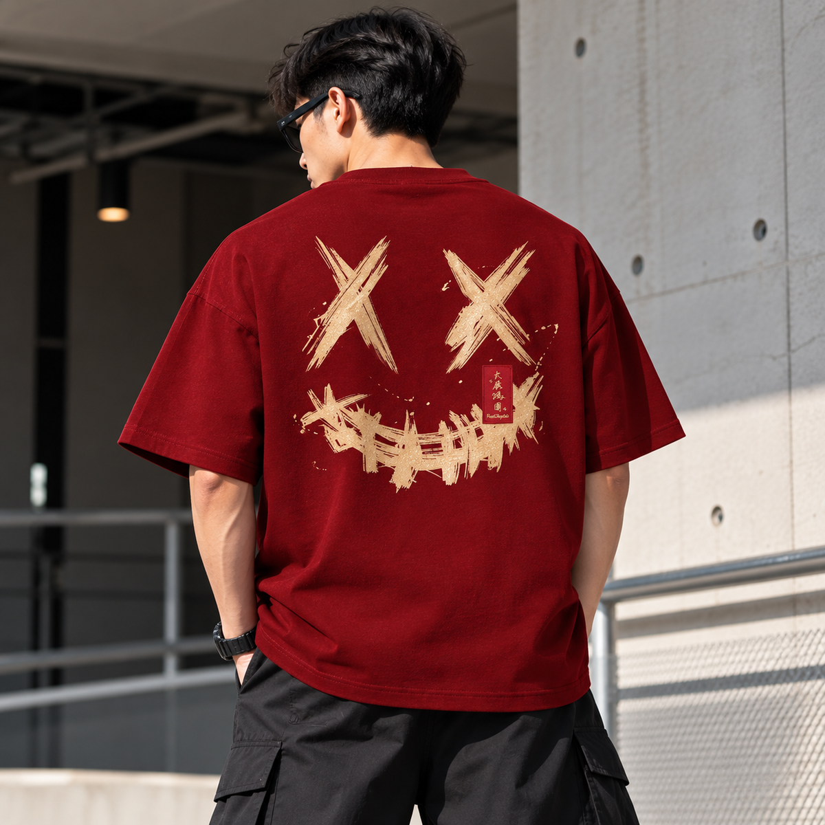 Red Rickyisclown Golden Blessing Tee with graphic design, casual apparel, featuring bold yellow and gold accents.