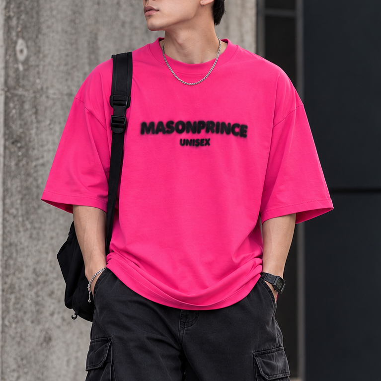 Pink MasonPrince Classic Spray Logo Tee featuring a front logo design and casual fit on a soft cotton fabric.