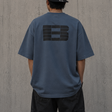Boneless B Foam Logo Tee in grey and blue, casual apparel t-shirt with logo design on front, made by BONELESS.