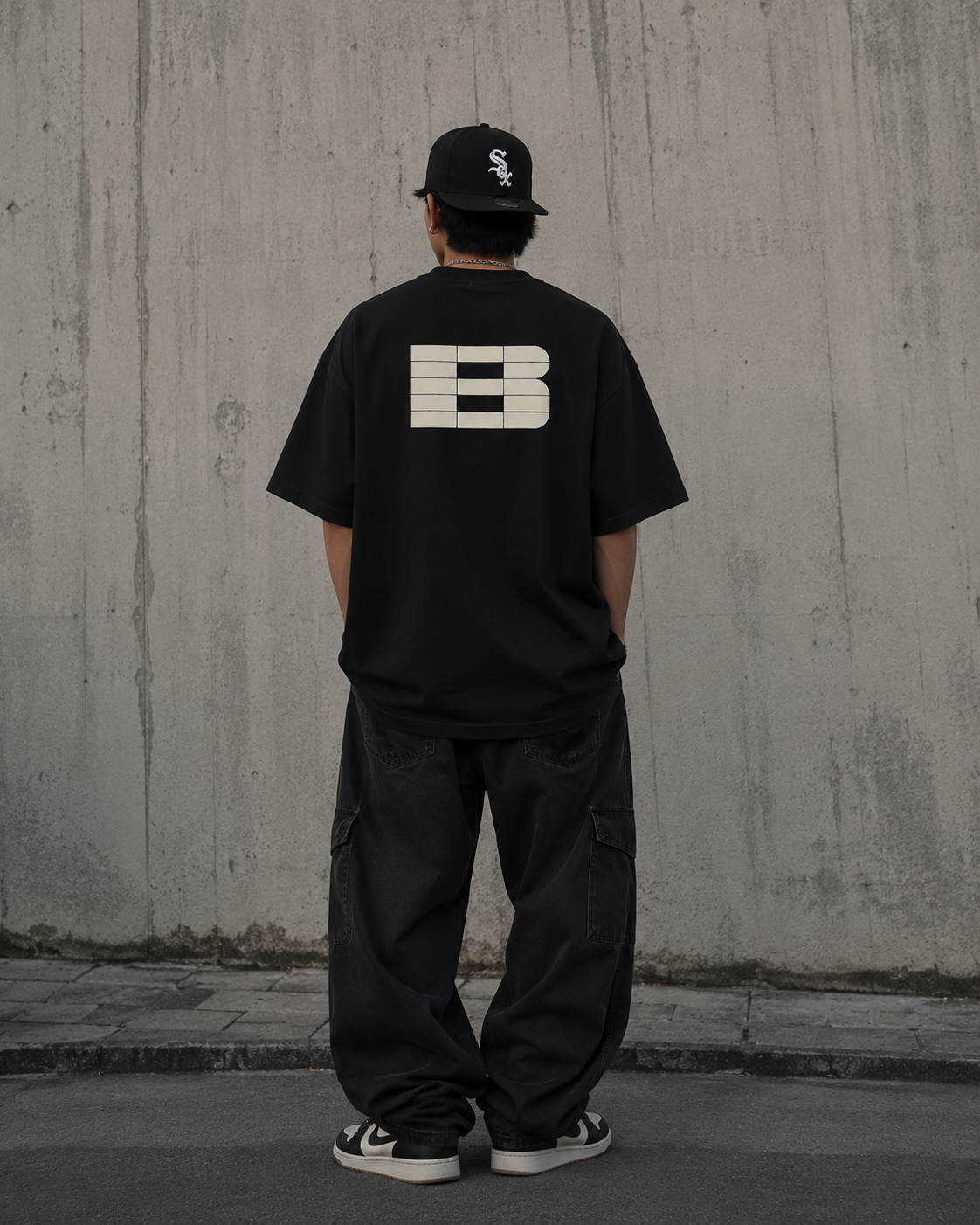 Black Boneless B Foam Logo Tee, a casual men's t-shirt with a bold logo print, made by BONELESS.