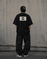 Black Boneless B Foam Logo Tee, a casual men's t-shirt with a bold logo print, made by BONELESS.