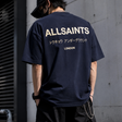 AllSaints Underground Logo Tee in MoonLit Blue, casual men's t-shirt with printed logo on front, soft fabric, and comfortable fit.