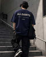 AllSaints Underground Logo Tee in MoonLit Blue, casual men's t-shirt with all-over logo print and round neckline.