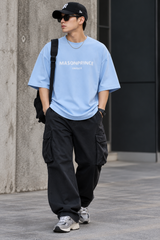 Sky blue MasonPrince Classic Spray Logo T-shirt, casual apparel featuring a distinctive spray logo design on the front.
