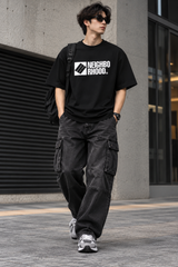 Black NEIGHBORHOOD SS-3 Tee shirt with a classic crew neck and minimal branding, displayed on a plain background.